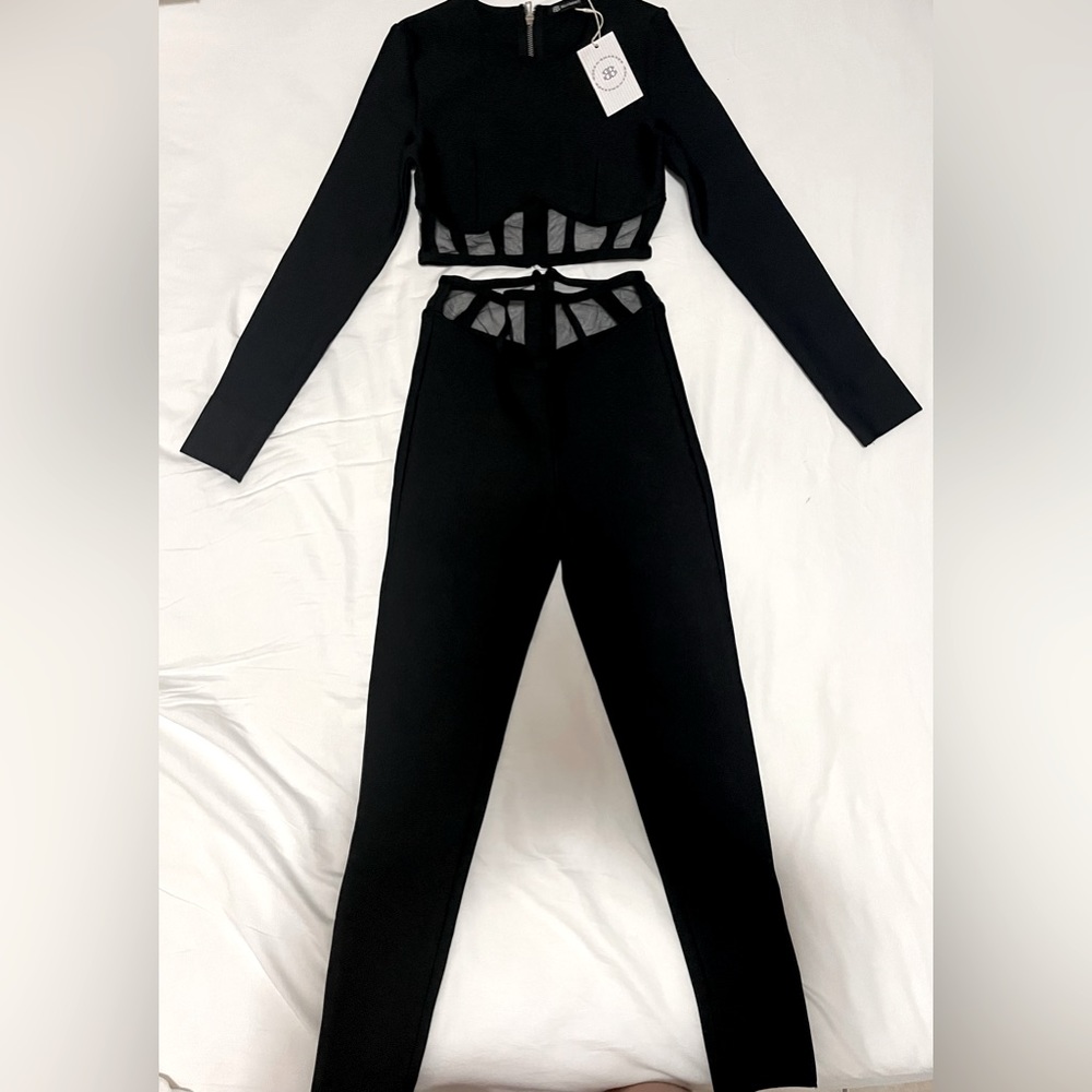 Good quality, think spandex that will suck you in with a mesh/tulle like detail.